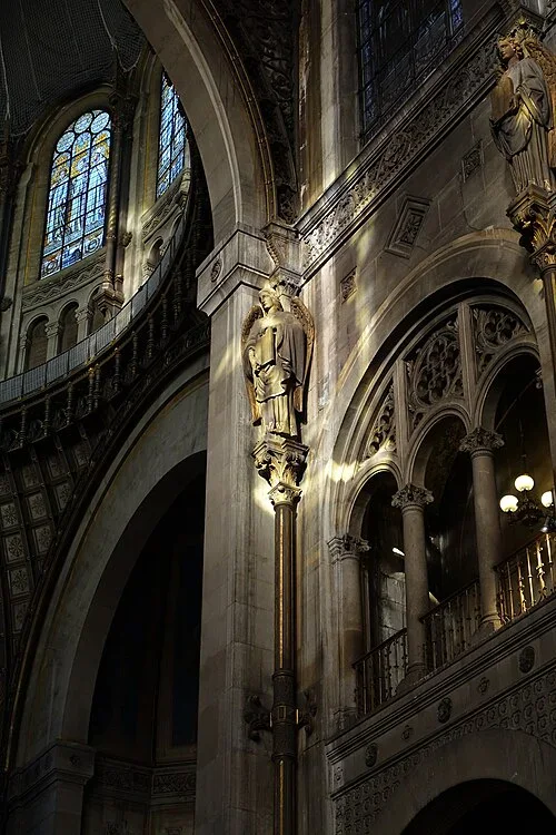 Polychrome Angels on Cast-Iron Columns